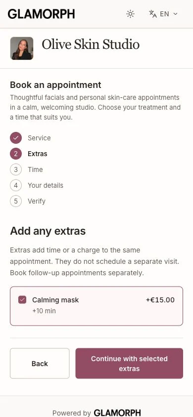 Glamorph booking app in English with a selected calming-mask add-on and updated appointment total